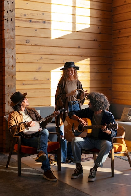 Free photo full shot country musicians indoors