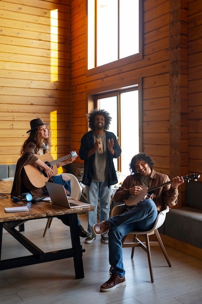 Full shot country musicians indoors