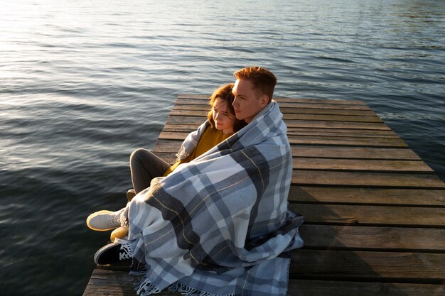 Full shot couple in affectionate attitude