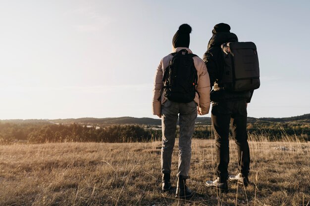 Full shot couple holding hands