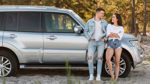 Full shot couple posing together