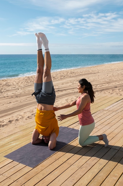 Full shot couple training outdoors