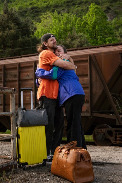 Full shot couple traveling together