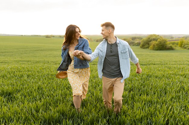 Full shot couple walking together