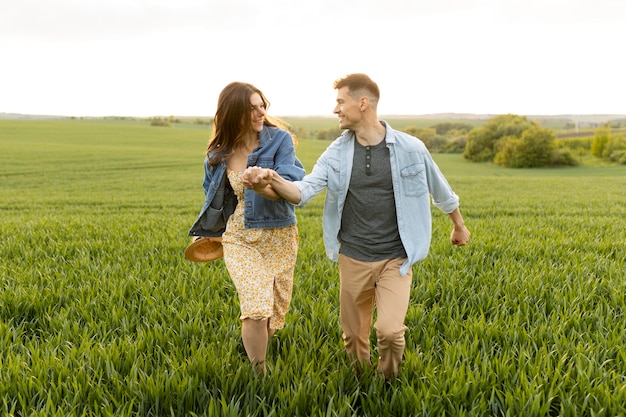 Full shot couple walking together