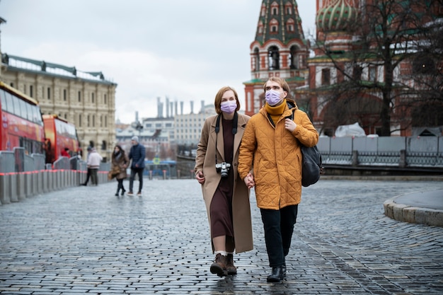 Full shot couple walking together