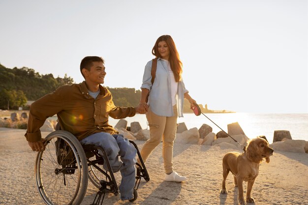 Full shot couple with cute dog