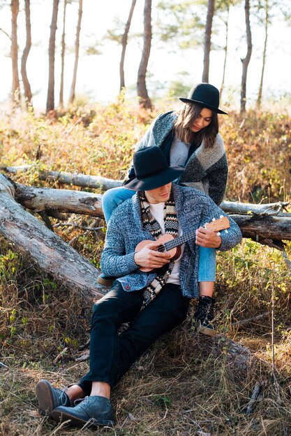 Full shot cute couple in the nature