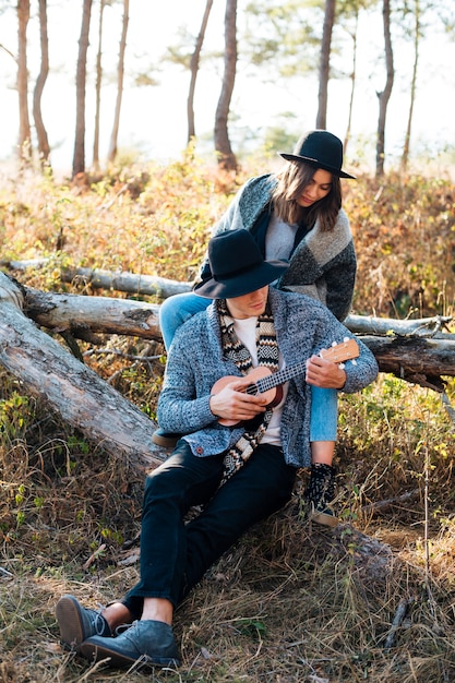 Full shot cute couple in the nature