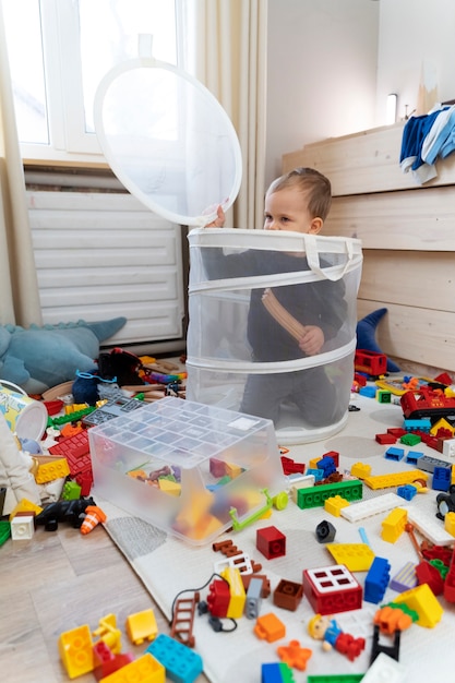 Full shot cute kid playing in living room