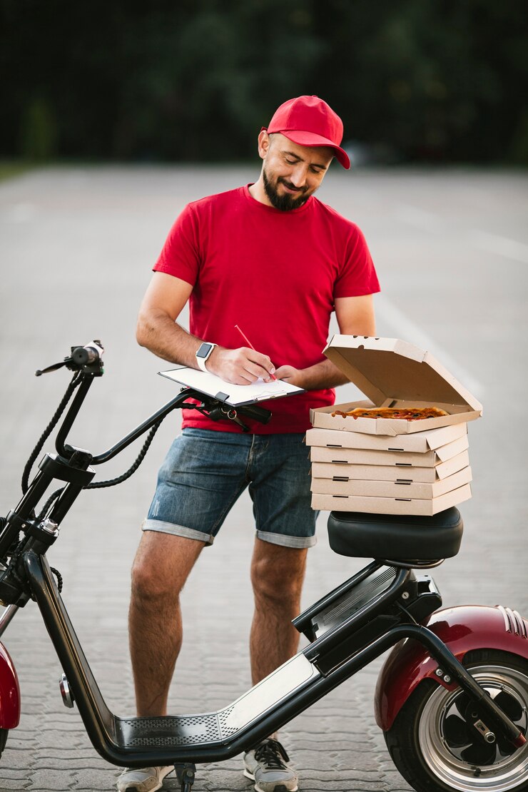 Free Photo full shot delivery guy writing in clipboard