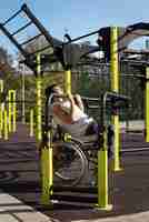 Free photo full shot disabled man doing sport in park