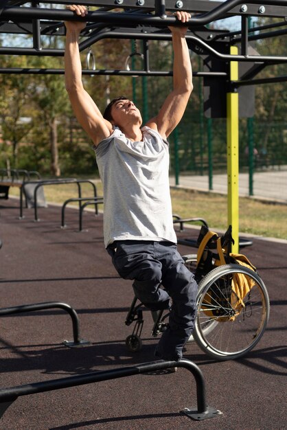 Full shot disabled man training arms