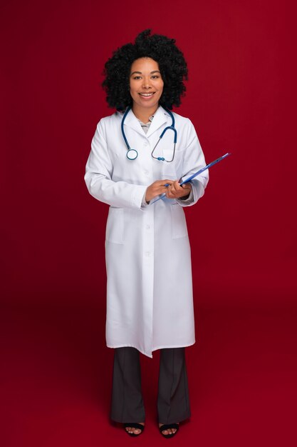 Full shot doctor posing in studio