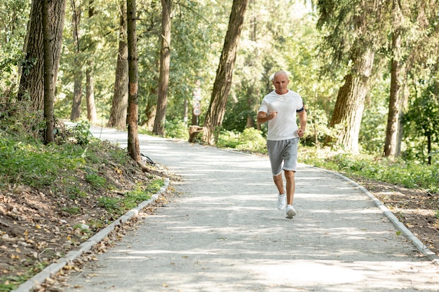 Full shot elder man running