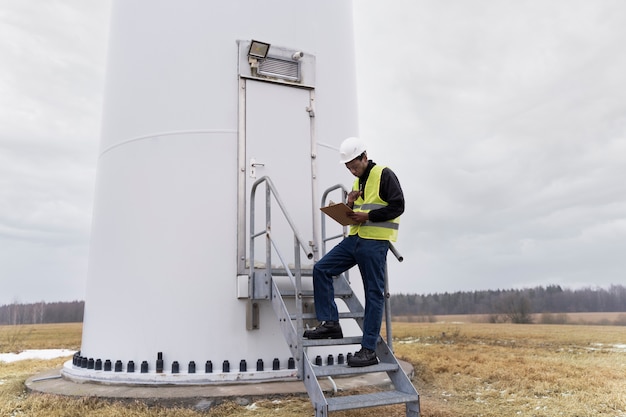 Full shot engineer wearing equipment