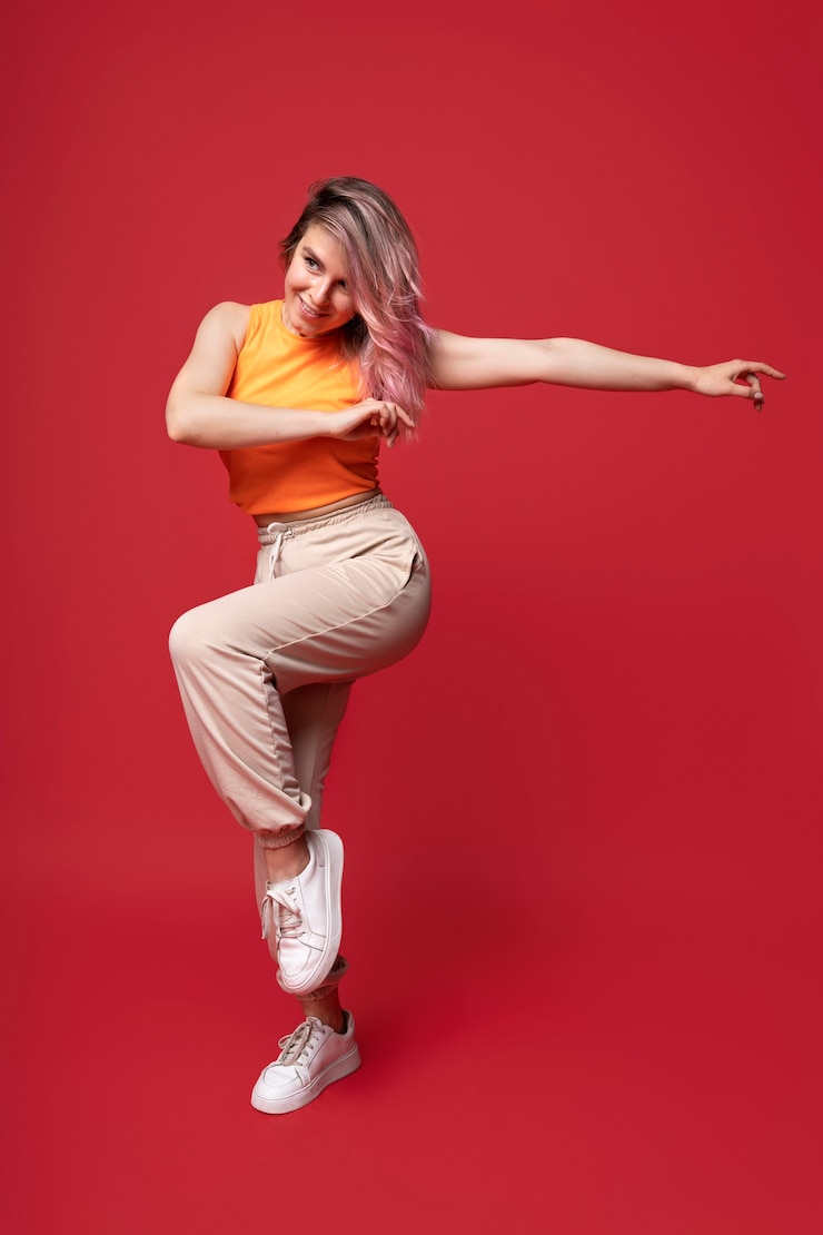 Free Photo full shot expressive woman moving her body