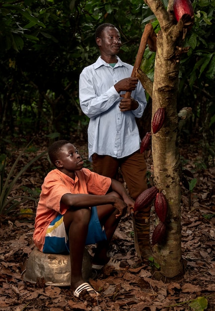 Full shot father and boy outdoors