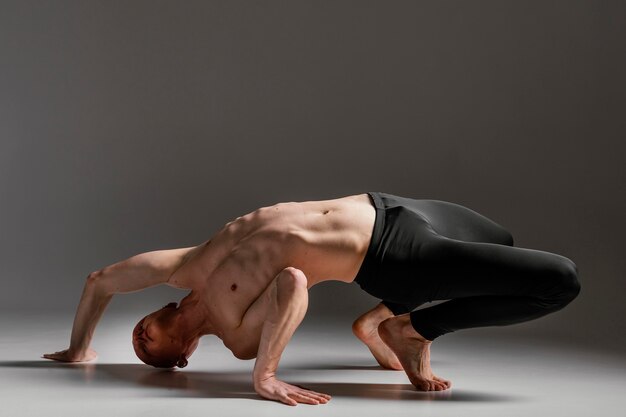 Full shot flexible man performing