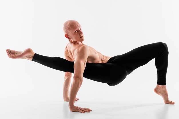 Full shot flexible man posing