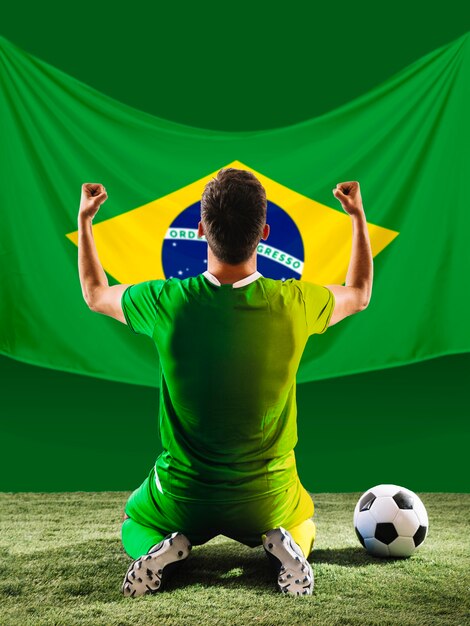 Full shot football player with brazilian flag