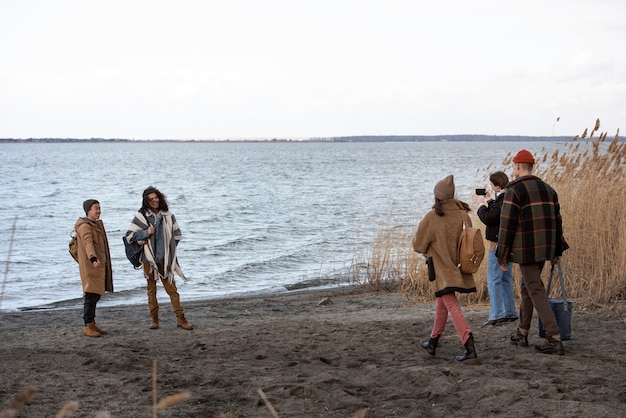 Full shot friends at beach