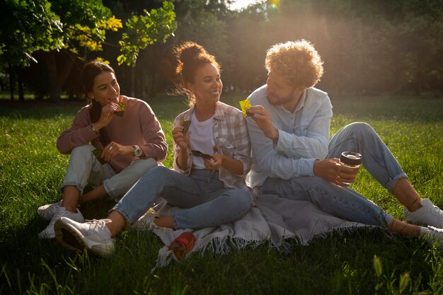 full shot friends eating seaweed snacks