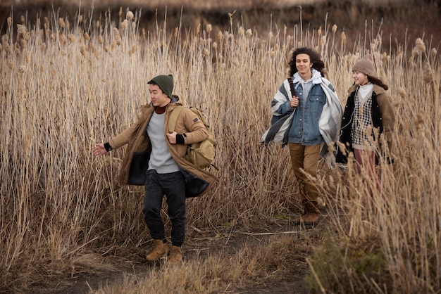 Full shot friends walking together