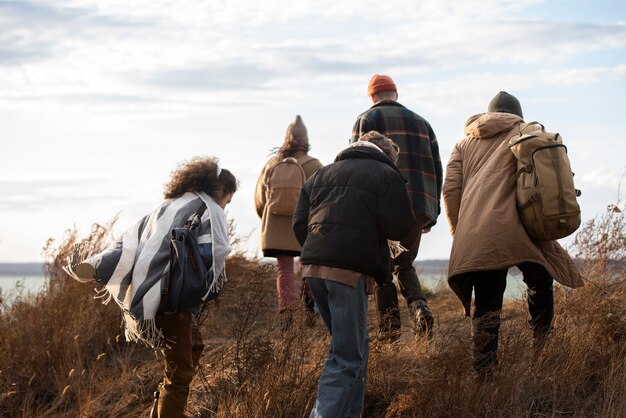 Full shot friends walking together