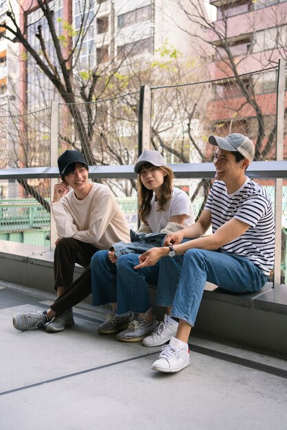 Full shot friends wearing trucker hats