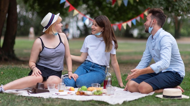 Full shot friends with medical masks