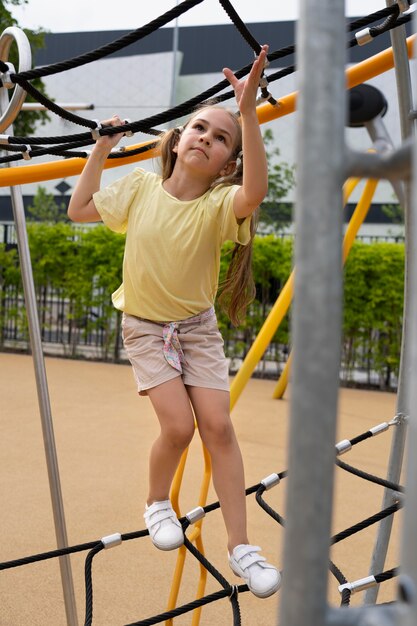 Full shot girl doing exercise