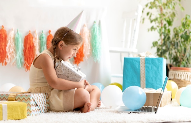 Full shot girl holding present