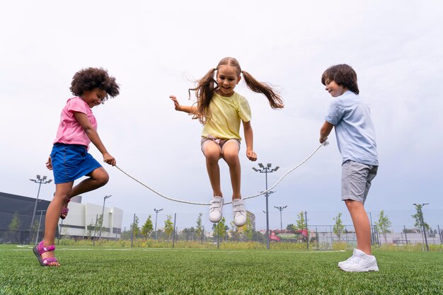 full shot girl jumping rope