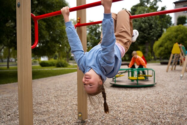 Full shot girl with down syndrome playing