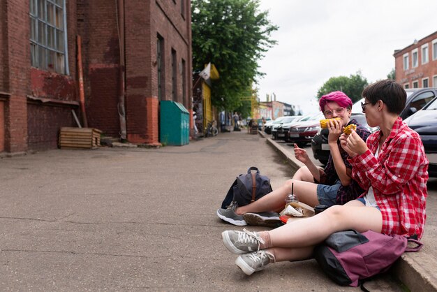 Full shot girls eating together