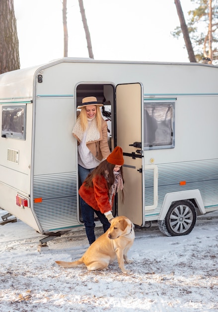 Full shot happy family with dog