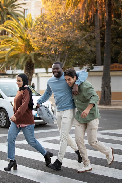 Full shot happy people walking together