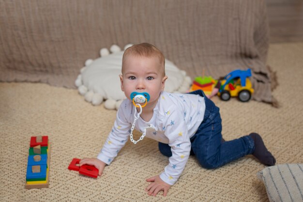 Full shot kid crawling at home