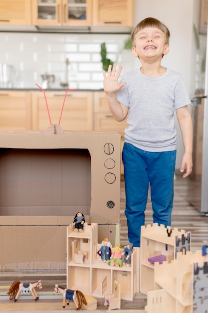 Full shot kid playing indoors