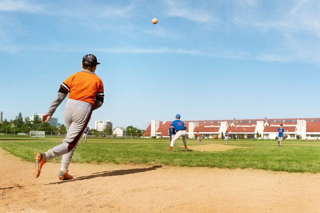 Full shot kid running after ball