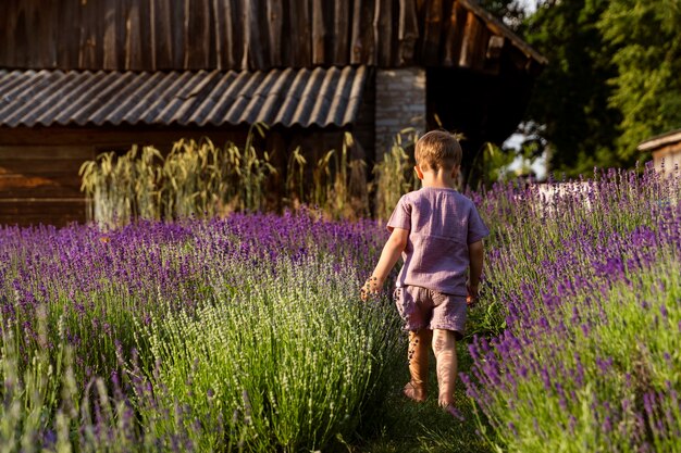 Full shot kid walking outdoors
