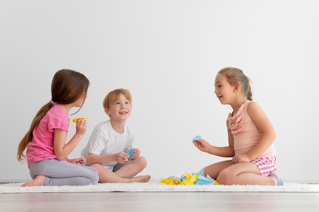 full shot kids playing together