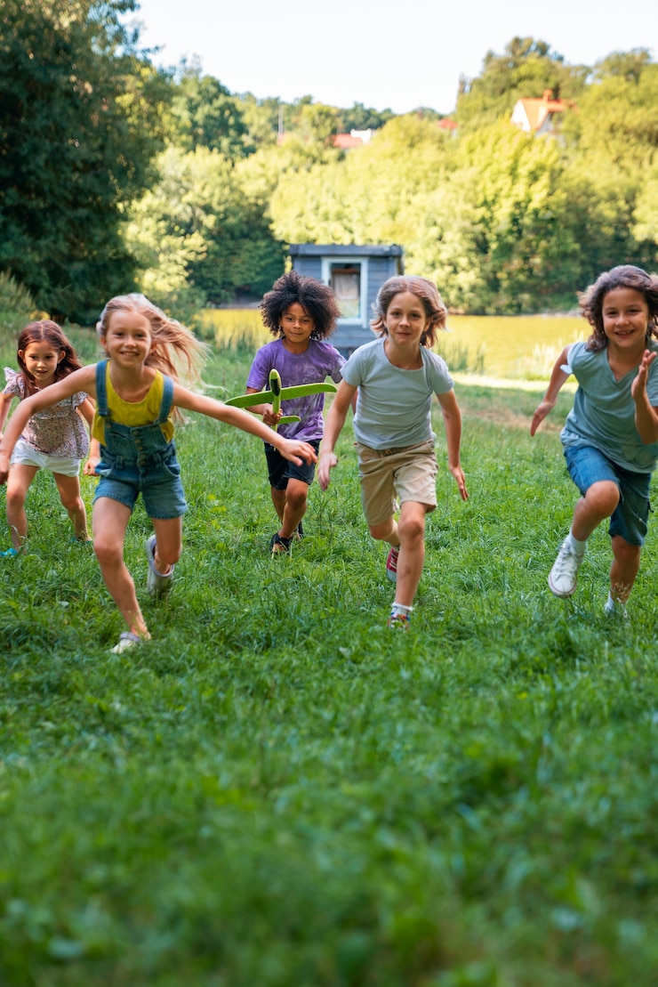 Free Photo full shot kids running outdoors