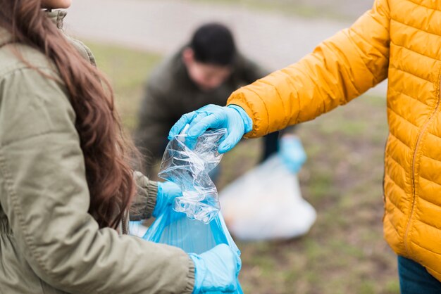 Full shot of kids with plastic bags