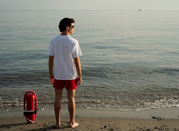 Full shot lifeguard with lifesaving buoy