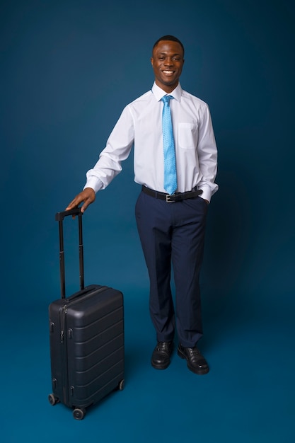 Free photo full shot male flight attendant posing