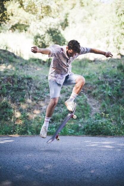 Full shot of man doing tricks