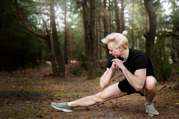 Full shot man exercising outdoors