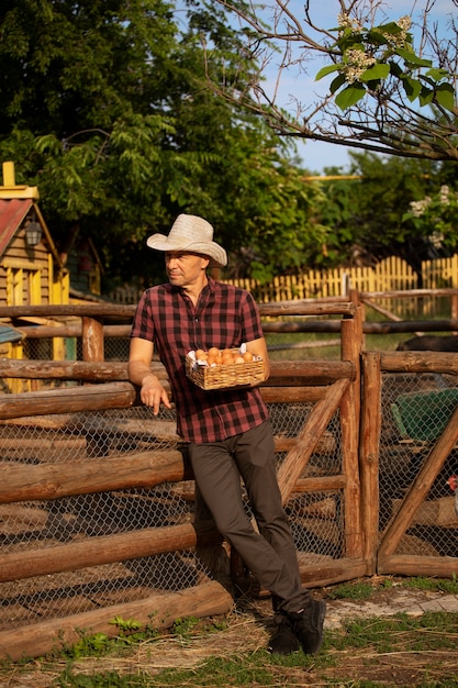Free Photo full shot man living at farmhouse